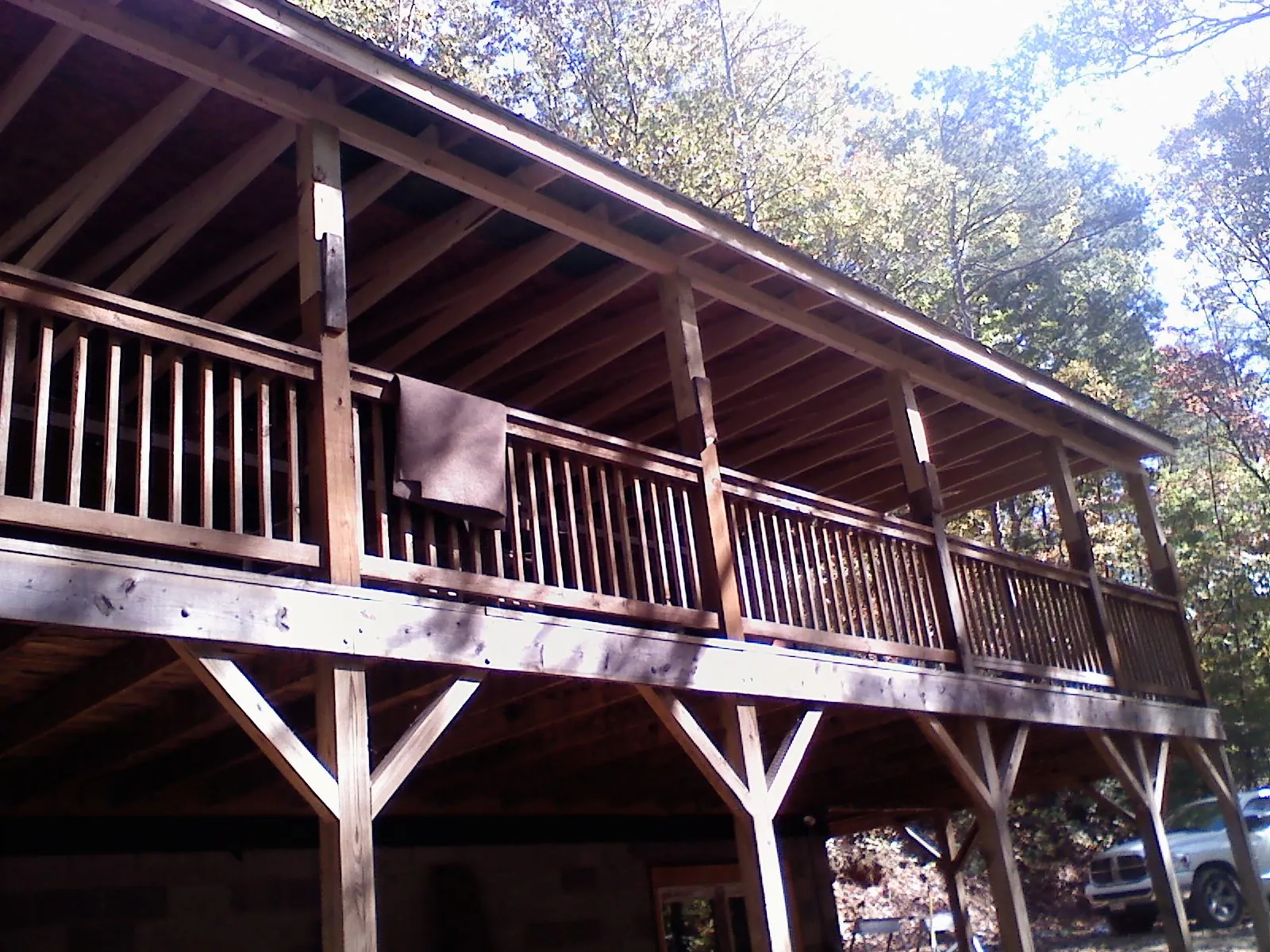 Timber framing under a new elevated porch and deck — Roof Leak Repair in Tinley Park by Roofing Brothers